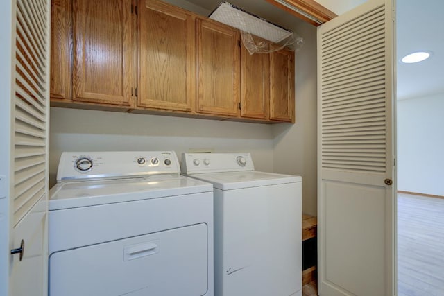 1922 Paris Ave, Redding, CA 96001 - washroom with washer and clothes dryer and cabinet space