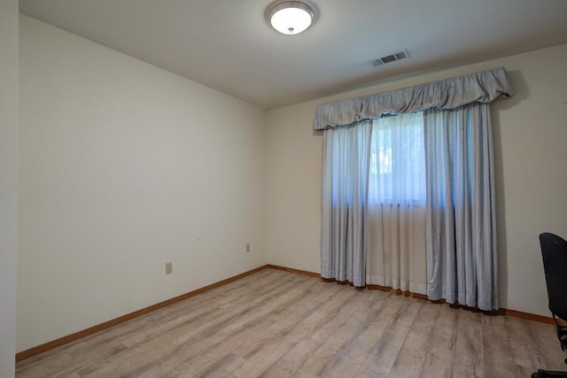 1922 Paris Ave, Redding, CA 96001 - empty room featuring light wood-style floors and baseboards
