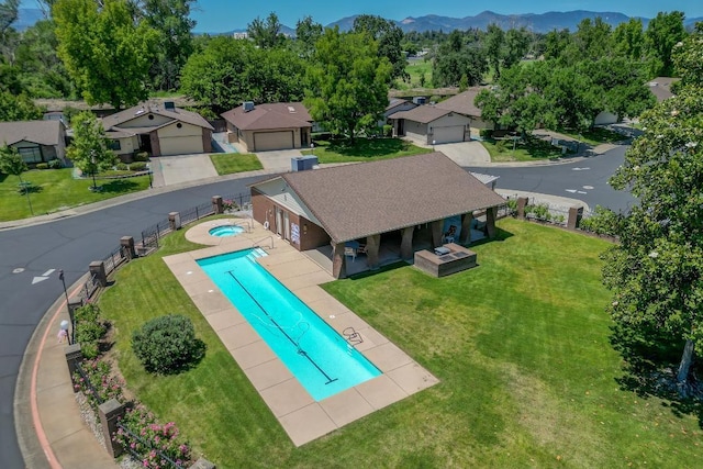 1922 Paris Ave, Redding, CA 96001 - community pool featuring a hot tub, a patio area, and a mountain view