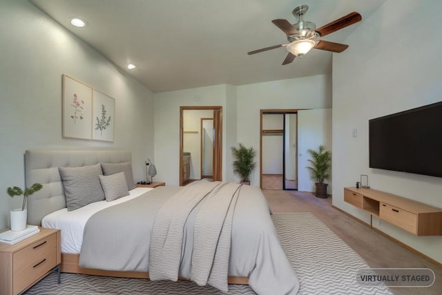 1922 Paris Ave, Redding, CA 96001 - bedroom featuring light colored carpet, a closet, recessed lighting, connected bathroom, and lofted ceiling
