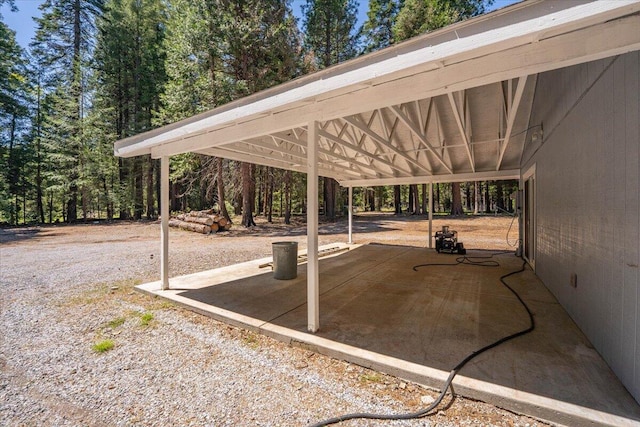 9279 Thatcher Mill Rd, Shingletown, CA 96088 - view of patio / terrace with a carport