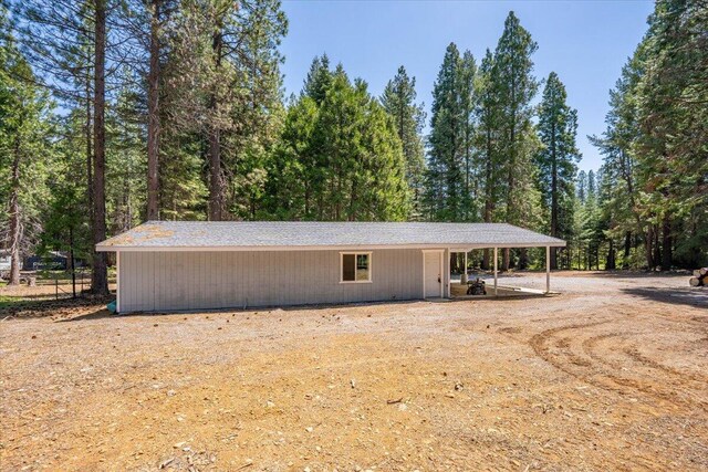 9279 Thatcher Mill Rd, Shingletown, CA 96088 - view of outbuilding featuring a carport