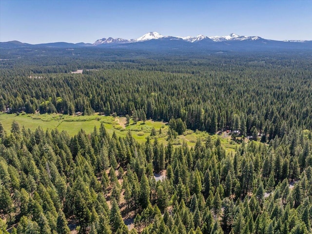 9279 Thatcher Mill Rd, Shingletown, CA 96088 - bird's eye view of a heavily wooded area and a mountainous background