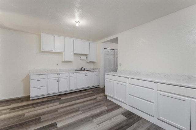 9279 Thatcher Mill Rd, Shingletown, CA 96088 - kitchen with white cabinets, dark wood-type flooring, and a sink