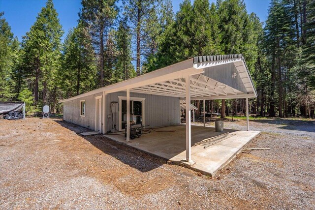 9279 Thatcher Mill Rd, Shingletown, CA 96088 - view of parking / parking lot featuring a carport