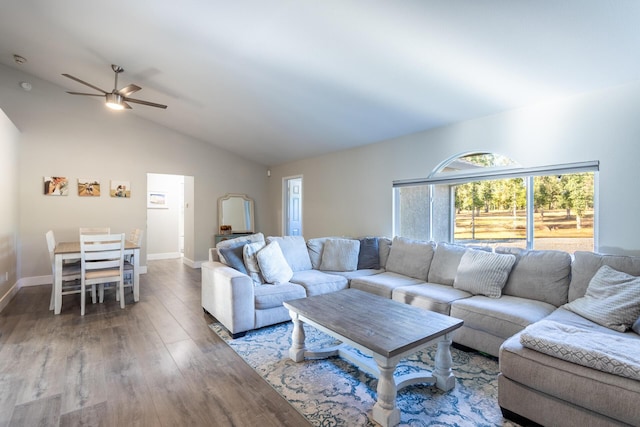 10844 Green Oaks Ln, Redding, CA 96003 - living area featuring wood finished floors, ceiling fan, vaulted ceiling, and baseboards