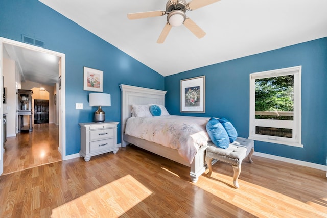 1163 Golden Gate Trl, Redding, CA 96003 - bedroom with vaulted ceiling, wood finished floors, baseboards, and a ceiling fan