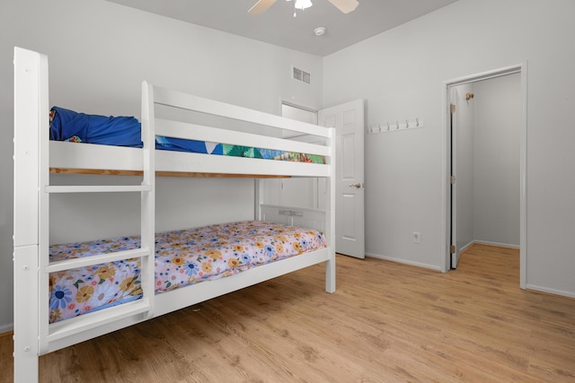 13955 Dusty Oaks Trl, Bella Vista, CA 96008 - bedroom with wood finished floors, baseboards, and a ceiling fan