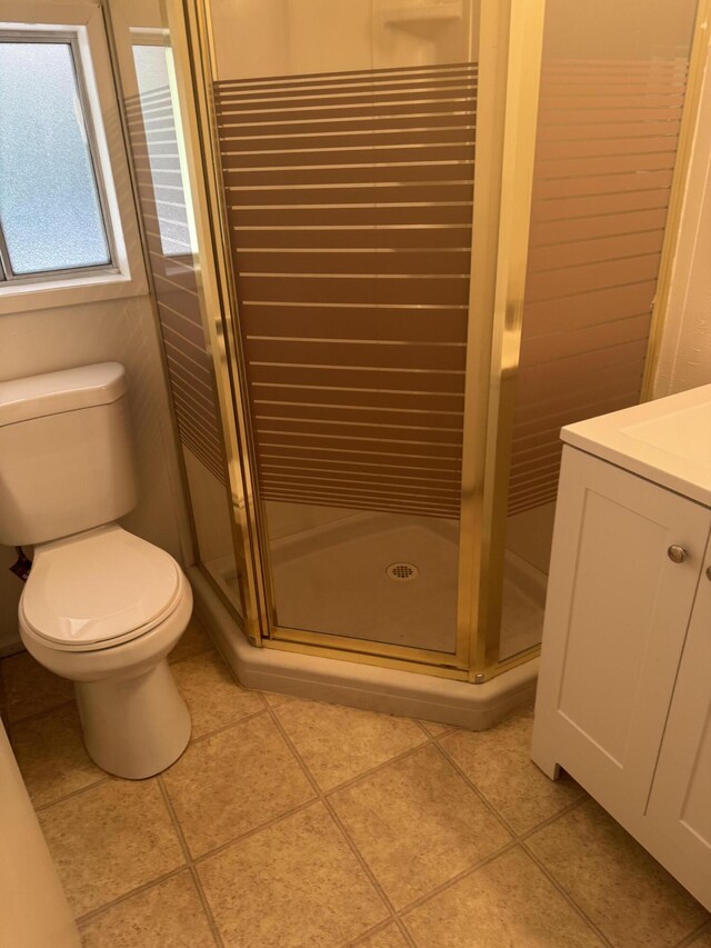 1717 Deer Creek Rd, Shasta Lake, CA 96019 - bathroom featuring toilet, a shower stall, vanity, and tile patterned floors