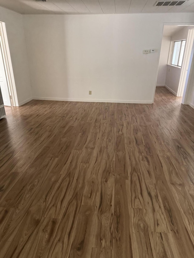 1717 Deer Creek Rd, Shasta Lake, CA 96019 - unfurnished room with dark wood-style flooring and baseboards