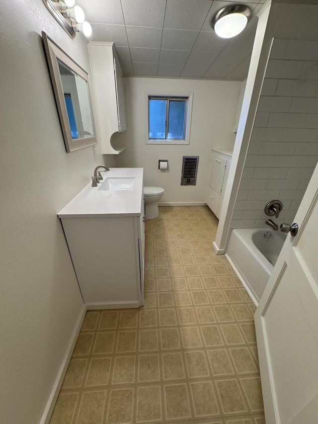 1717 Deer Creek Rd, Shasta Lake, CA 96019 - full bath with vanity, heating unit, baseboards, toilet, and shower / bath combination