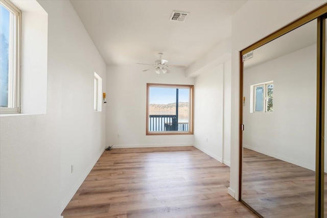4740 Rainbow, Weed, CA 96094 - unfurnished room with a ceiling fan, light wood-style flooring, and baseboards