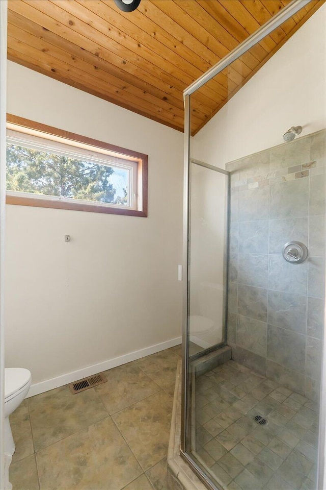 4740 Rainbow, Weed, CA 96094 - full bathroom with wood ceiling, a stall shower, tile patterned flooring, toilet, and vaulted ceiling