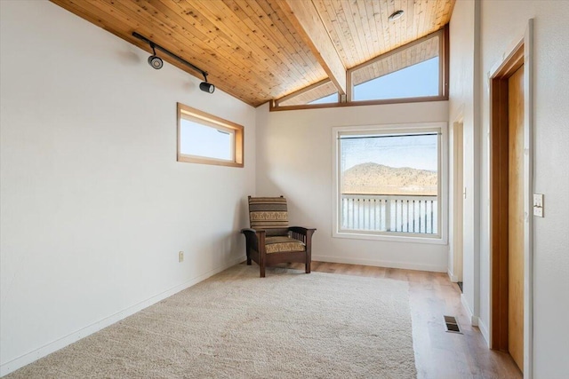 4740 Rainbow, Weed, CA 96094 - carpeted empty room with wooden ceiling and baseboards