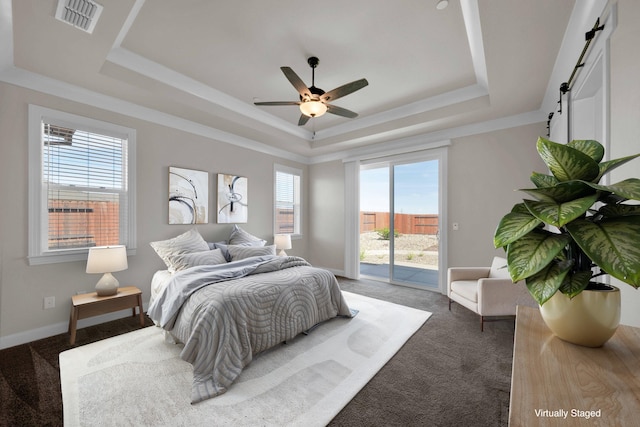 4771 Lower Springs Rd, Redding, CA 96001 - bedroom featuring a raised ceiling, a barn door, access to outside, and carpet