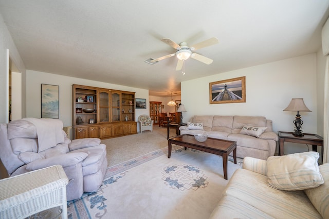 19991 Paso Robles Ave, Redding, CA 96003 - living room featuring light carpet and a ceiling fan
