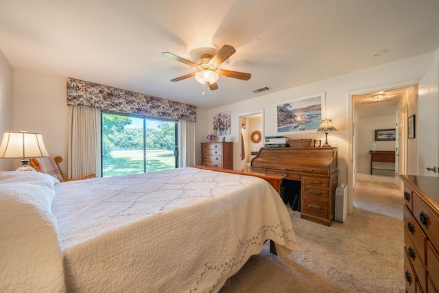 19991 Paso Robles Ave, Redding, CA 96003 - bedroom with light colored carpet, a ceiling fan, and access to outside
