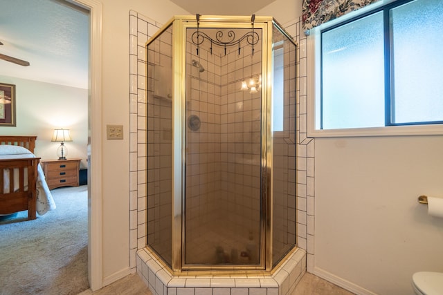 19991 Paso Robles Ave, Redding, CA 96003 - bathroom with a shower stall, ensuite bathroom, toilet, and a ceiling fan