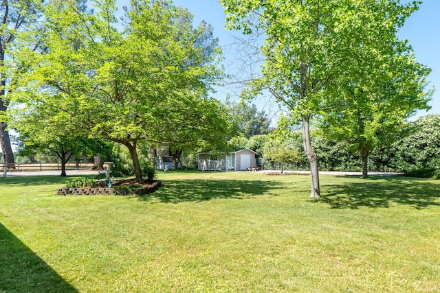 19991 Paso Robles Ave, Redding, CA 96003 - view of yard featuring an outbuilding