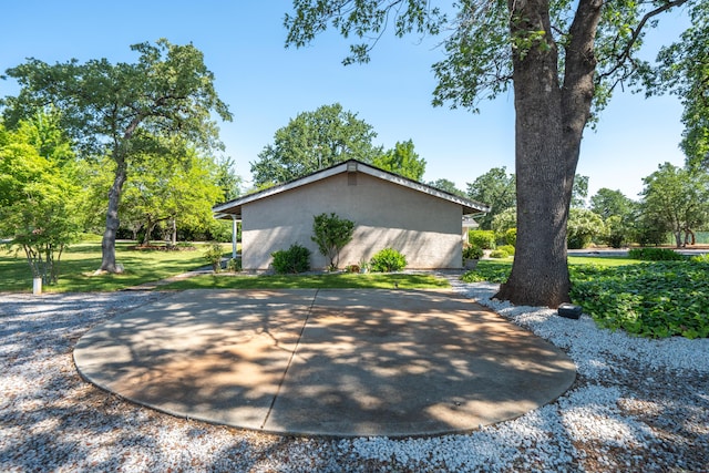 19991 Paso Robles Ave, Redding, CA 96003 - view of property exterior with stucco siding