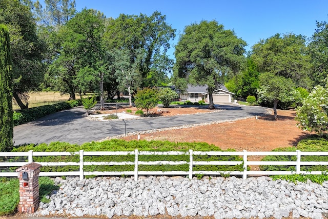 19991 Paso Robles Ave, Redding, CA 96003 - fenced yard featuring a garage