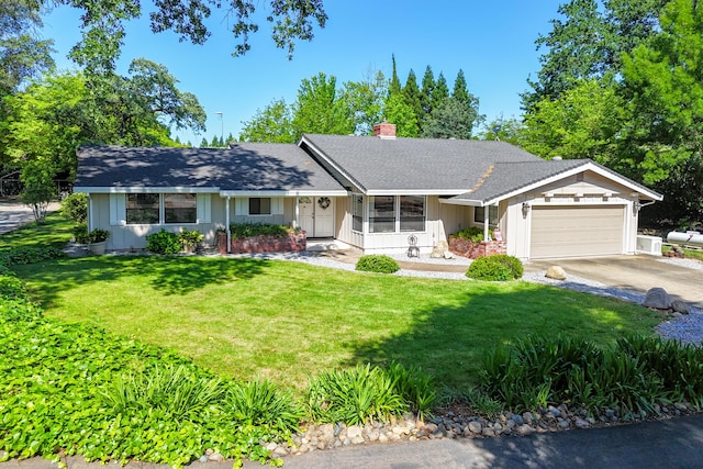 19991 Paso Robles Ave, Redding, CA 96003 - ranch-style house featuring an attached garage, a front yard, concrete driveway, a chimney, and board and batten siding