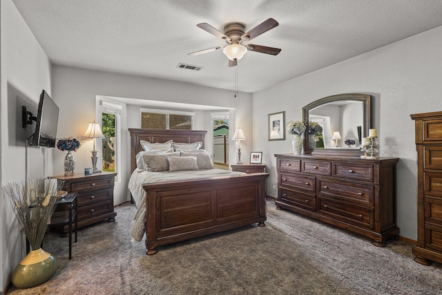 3608 Capricorn Way, Redding, CA 96002 - carpeted bedroom featuring a textured ceiling and a ceiling fan