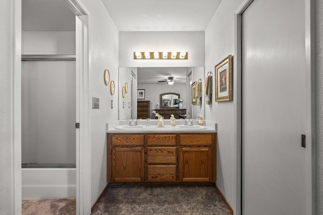 3608 Capricorn Way, Redding, CA 96002 - full bathroom with double vanity, ceiling fan, and baseboards