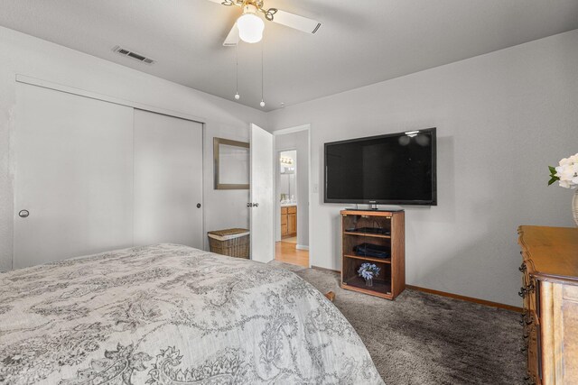 3608 Capricorn Way, Redding, CA 96002 - carpeted bedroom featuring a closet, baseboards, and a ceiling fan
