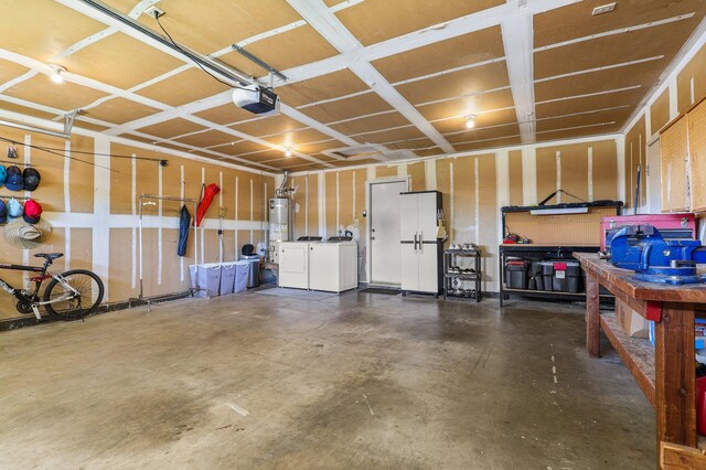 3608 Capricorn Way, Redding, CA 96002 - garage featuring washer and clothes dryer, a workshop area, a garage door opener, and gas water heater