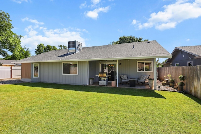 3608 Capricorn Way, Redding, CA 96002 - back of house with an outdoor living space, a shingled roof, a patio, and central AC unit
