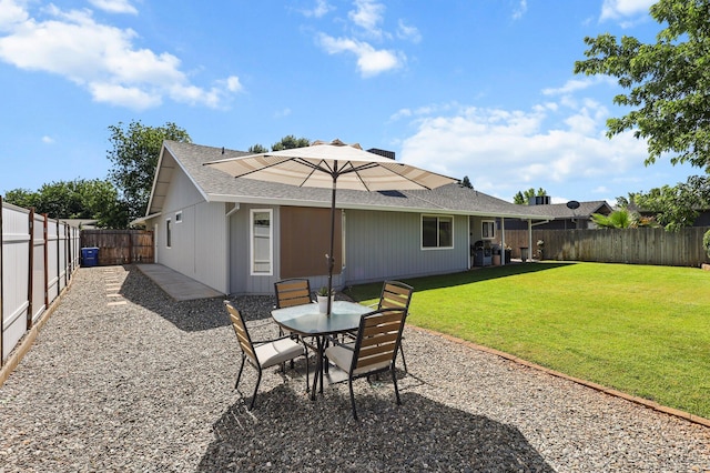 3608 Capricorn Way, Redding, CA 96002 - rear view of house with roof with shingles and a patio