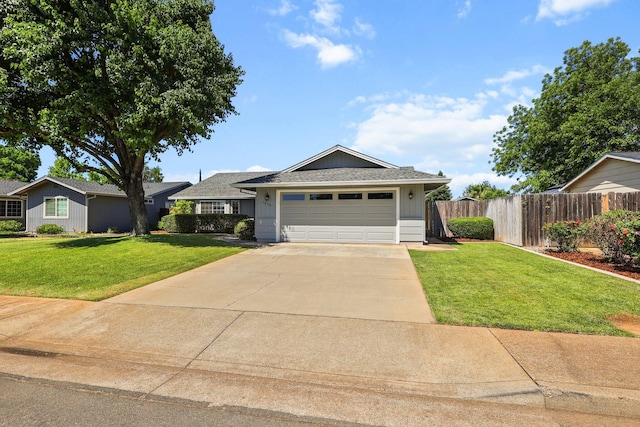 3608 Capricorn Way, Redding, CA 96002 - ranch-style house with a garage and concrete driveway