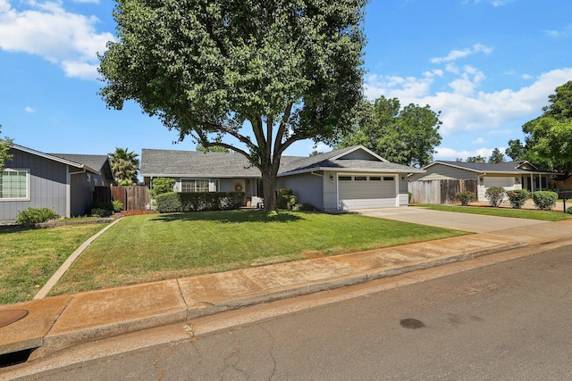 3608 Capricorn Way, Redding, CA 96002 - ranch-style home with an attached garage and concrete driveway