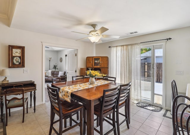 2654 Queens Way, Redding, CA 96001 - dining space with light tile patterned flooring, a ceiling fan, and baseboards