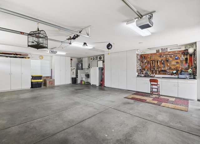 2654 Queens Way, Redding, CA 96001 - garage with a workshop area and a garage door opener