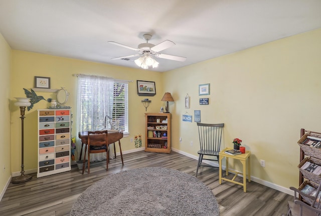 2654 Queens Way, Redding, CA 96001 - sitting room featuring wood finished floors, ceiling fan, and baseboards
