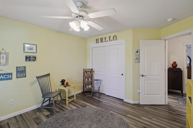 2654 Queens Way, Redding, CA 96001 - living area with dark wood finished floors, baseboards, and ceiling fan