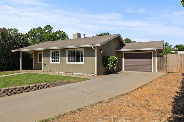 635 Nicklaus Ave, Red Bluff, CA 96080 - ranch-style house with a garage, driveway, and a shingled roof