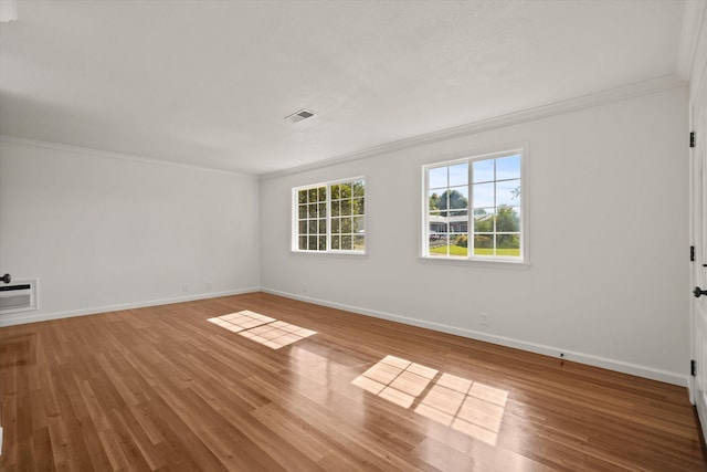 635 Nicklaus Ave, Red Bluff, CA 96080 - empty room featuring ornamental molding, baseboards, and wood finished floors