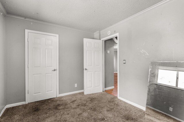 3262 Camellia St, Anderson, CA 96007 - unfurnished bedroom featuring crown molding, a textured ceiling, carpet, and baseboards