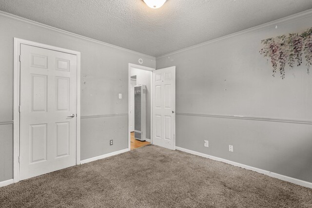 3262 Camellia St, Anderson, CA 96007 - unfurnished bedroom with a heating unit, carpet, a textured ceiling, crown molding, and baseboards