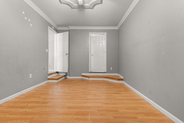 3262 Camellia St, Anderson, CA 96007 - unfurnished bedroom featuring wood finished floors, crown molding, and baseboards