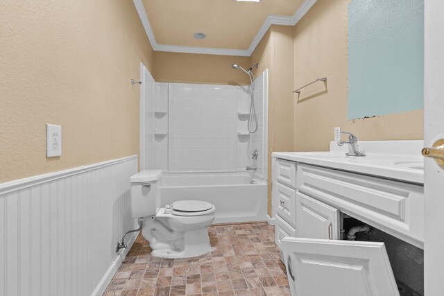 3262 Camellia St, Anderson, CA 96007 - bathroom featuring ornamental molding, toilet, vanity, washtub / shower combination, and stone finish flooring
