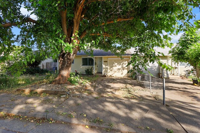 3262 Camellia St, Anderson, CA 96007 - view of front of home with a garage and driveway