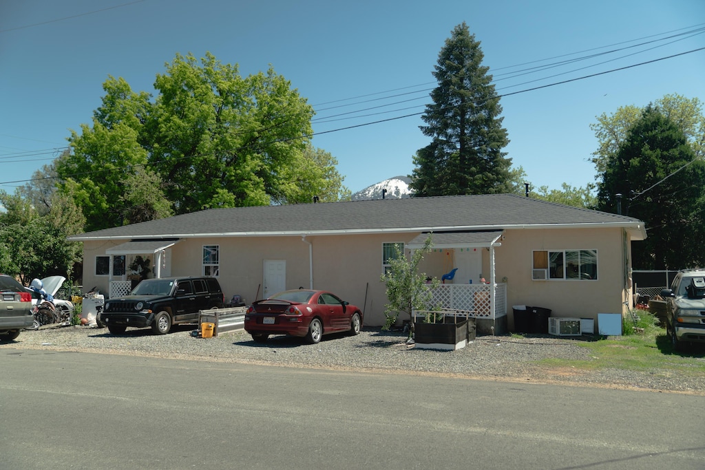 37111 Trinity St, Burney, CA 96013 - ranch-style home with stucco siding