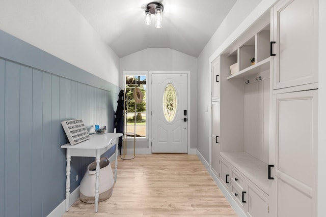 4223 Alta Mesa Dr, Redding, CA 96002 - mudroom with lofted ceiling, light wood-type flooring, and baseboards