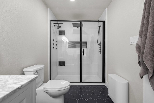 4223 Alta Mesa Dr, Redding, CA 96002 - bathroom with toilet, tile patterned flooring, vanity, and a stall shower