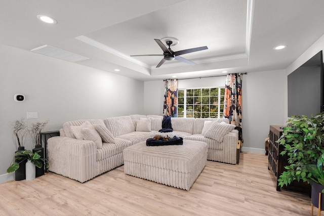 4223 Alta Mesa Dr, Redding, CA 96002 - living area with a tray ceiling, light wood-style flooring, ceiling fan, ornamental molding, and baseboards