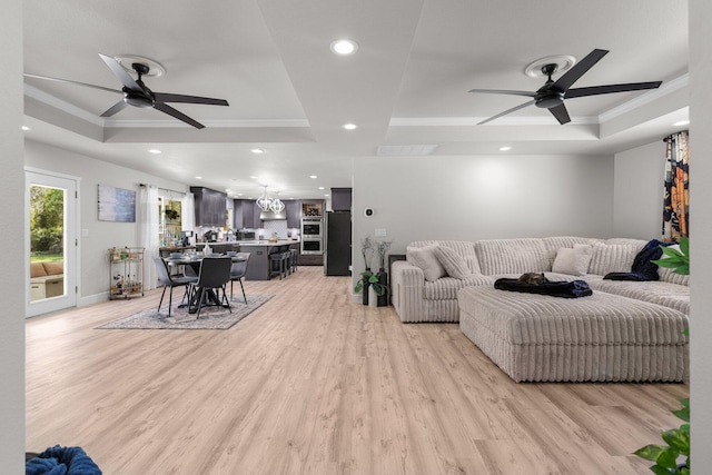 4223 Alta Mesa Dr, Redding, CA 96002 - living area with crown molding, ceiling fan, a tray ceiling, recessed lighting, and light wood-style floors
